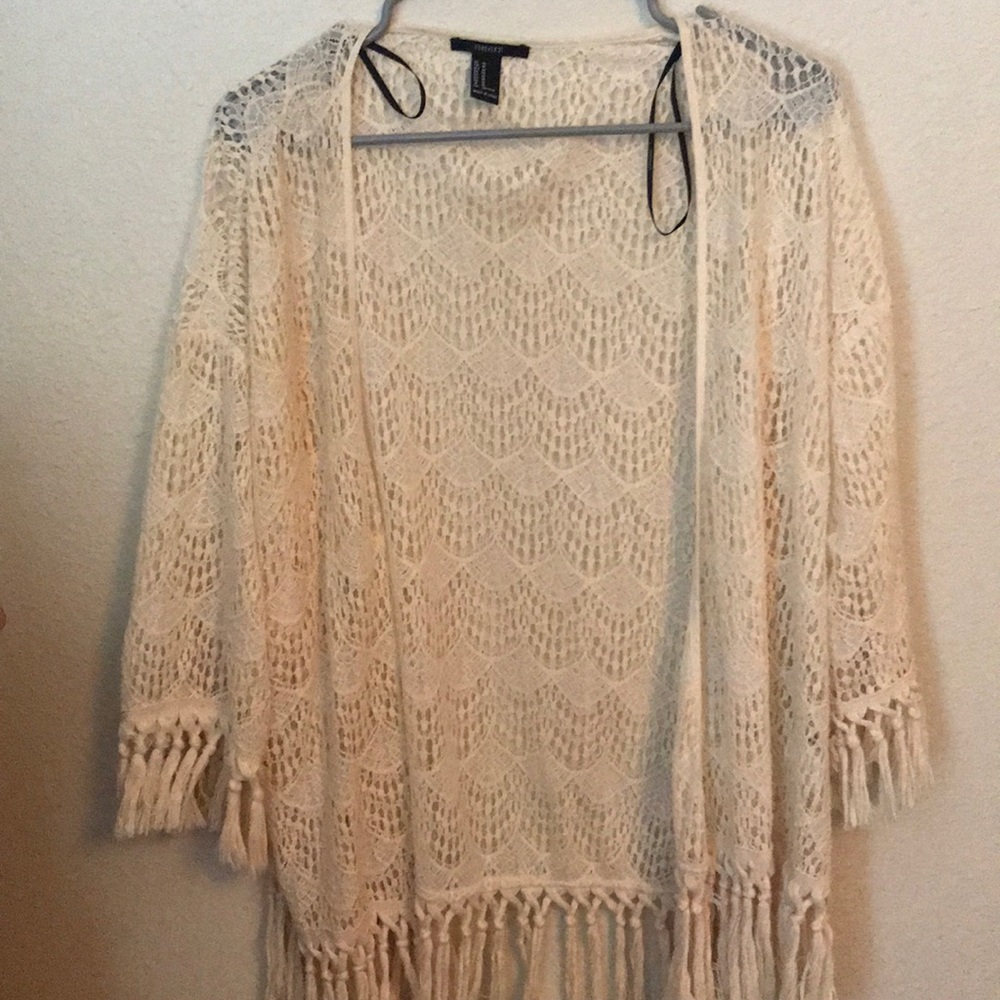 Worn once. Cream shall